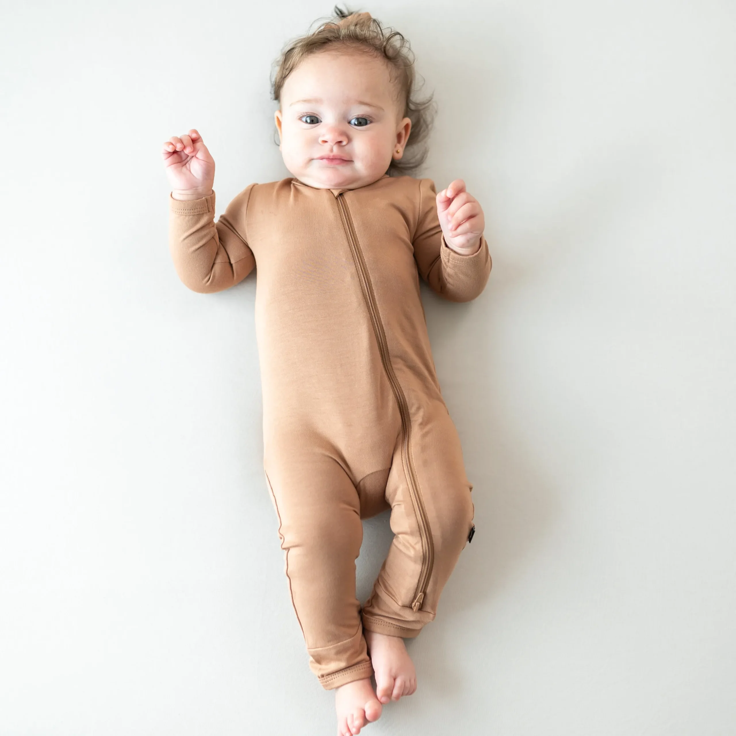 Best Kyte Baby Zippered Romper in Latte
