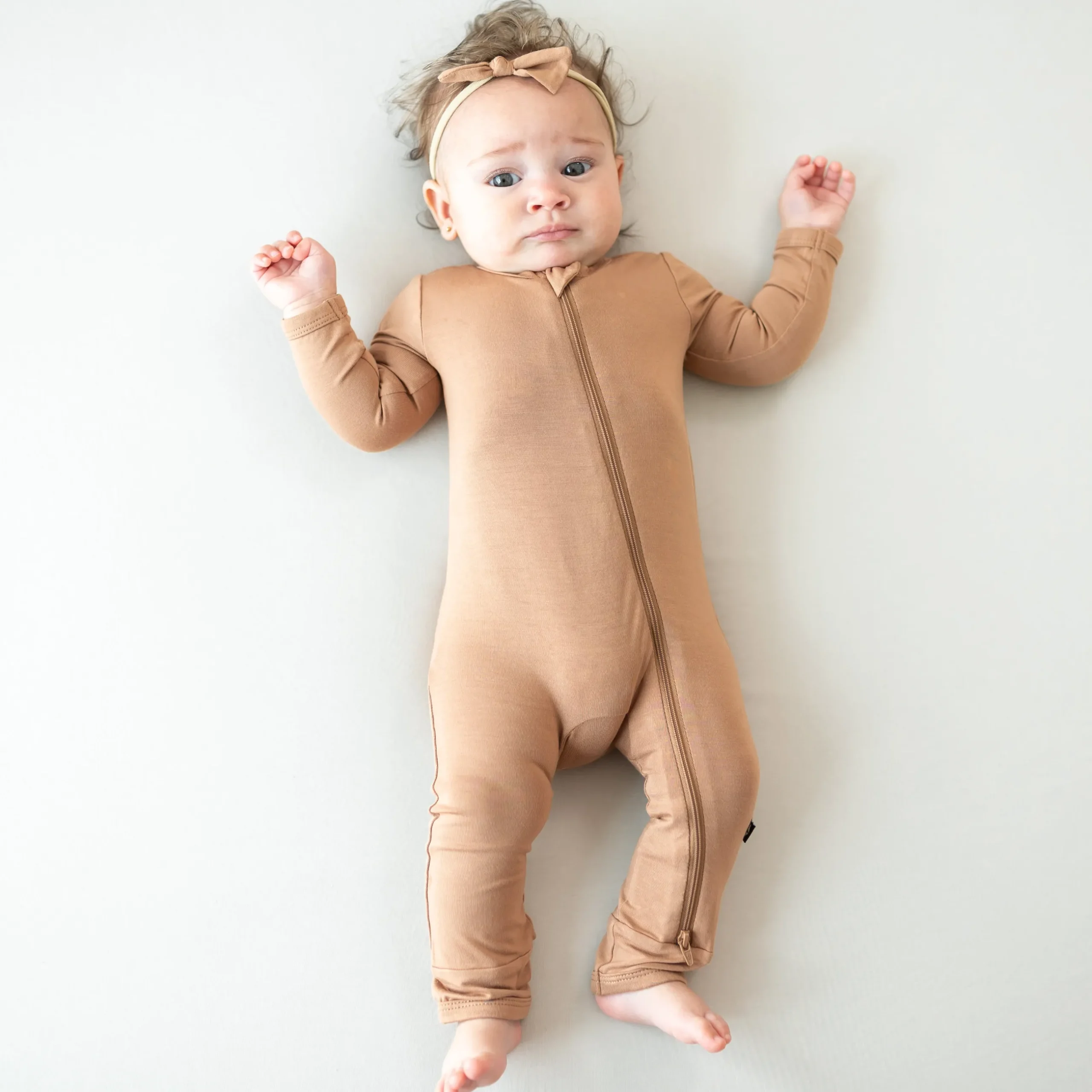Best Kyte Baby Zippered Romper in Latte