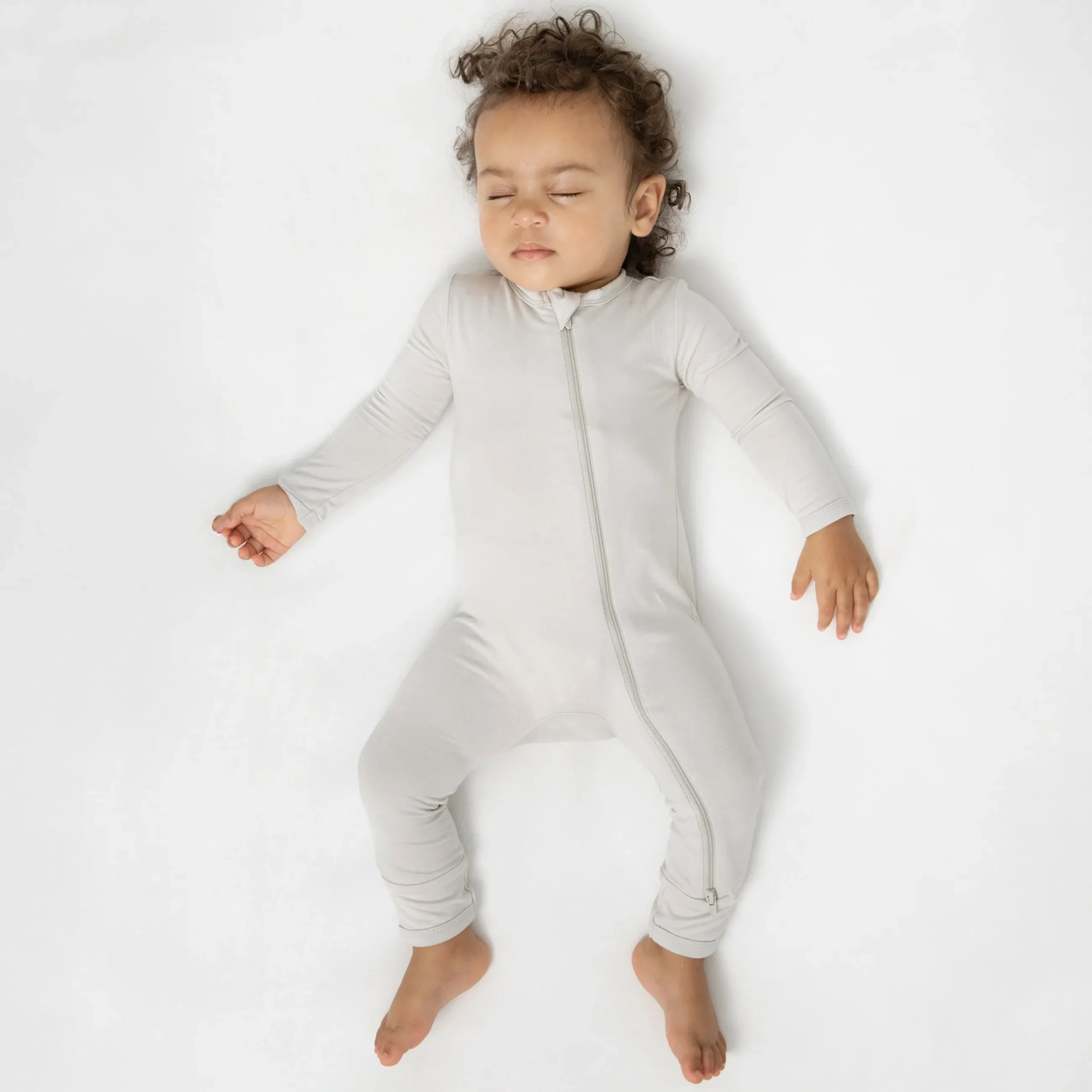 Kyte Baby Zippered Romper in Oat