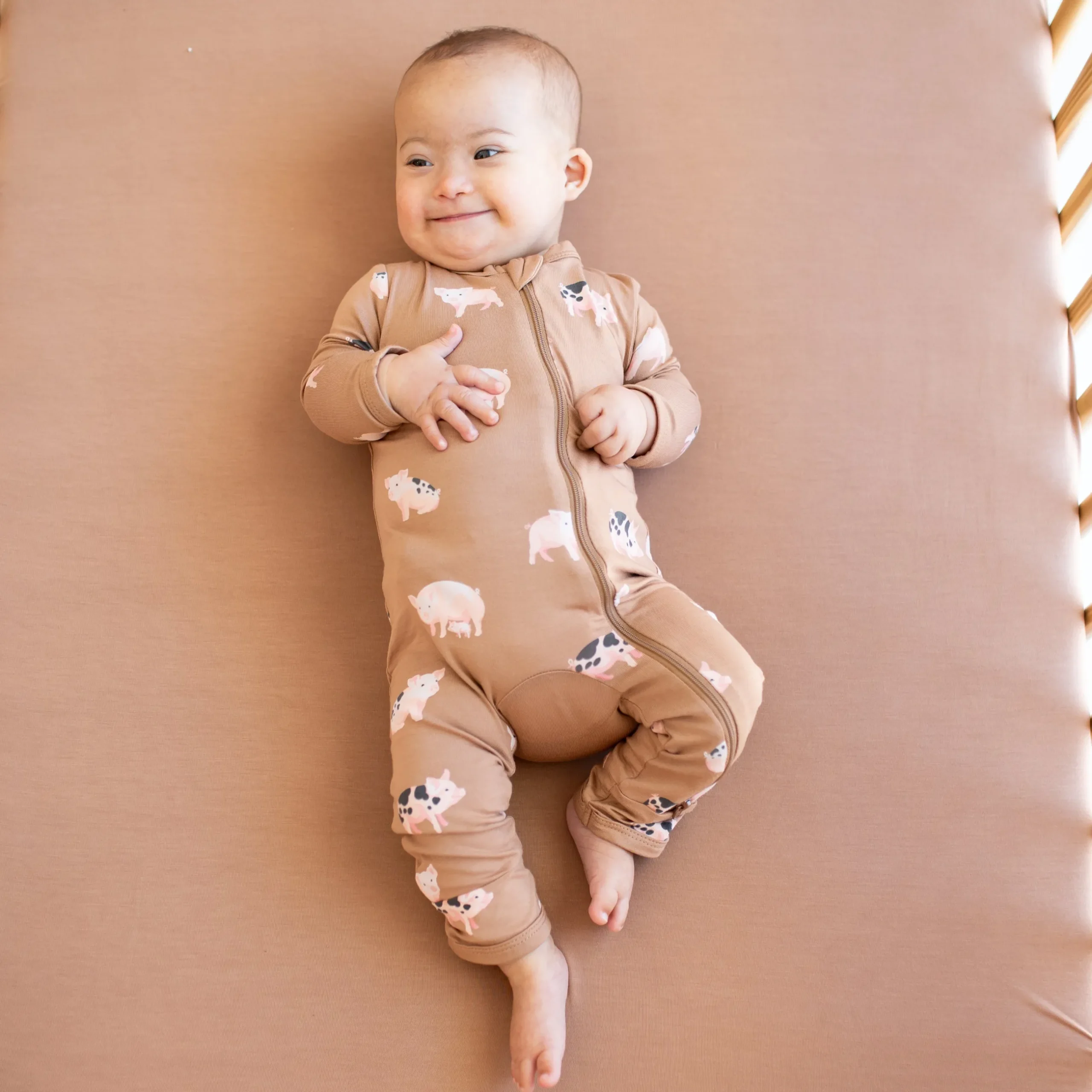 Sale Kyte Baby Zippered Romper in Pig