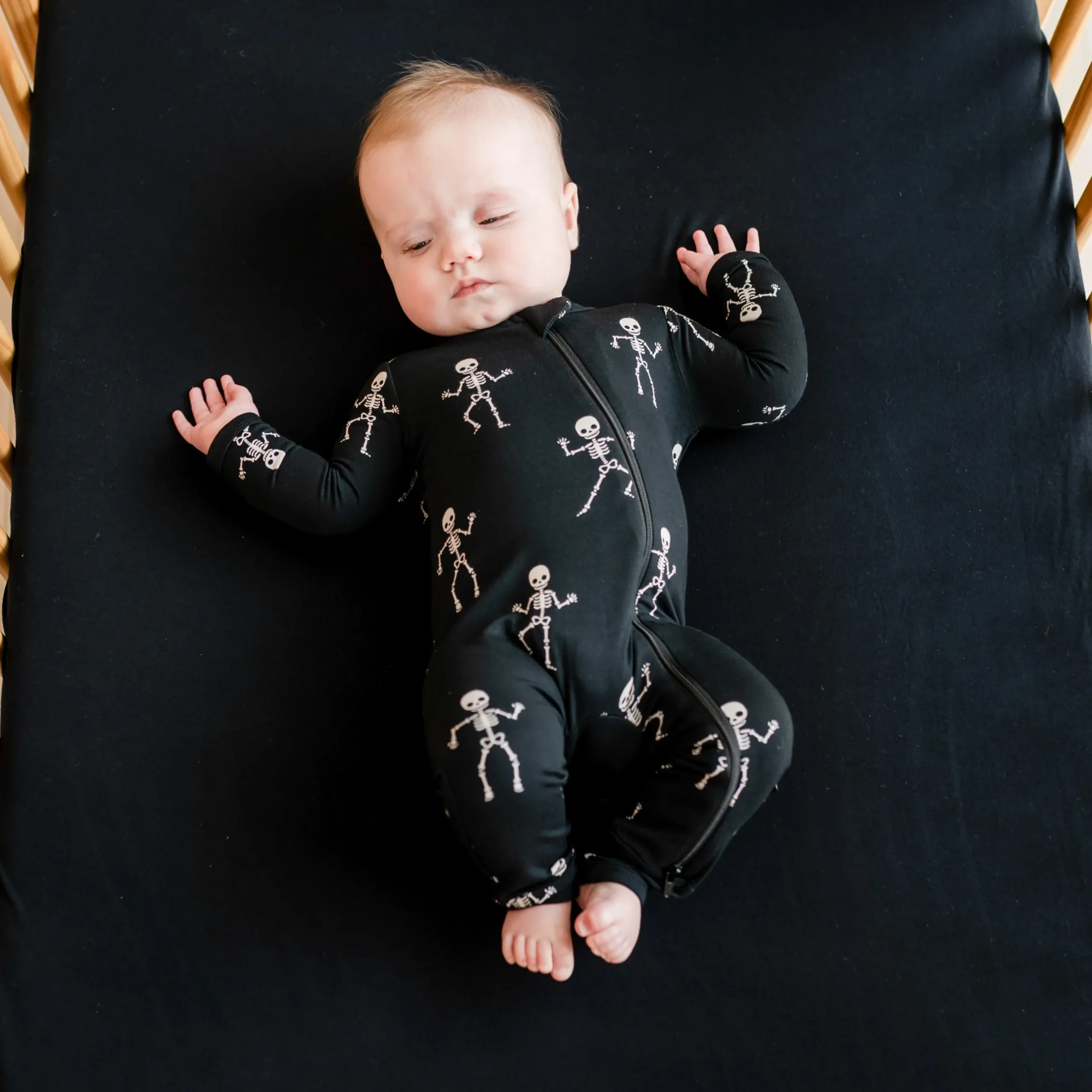 Clearance Kyte Baby Zippered Romper in Skeleton