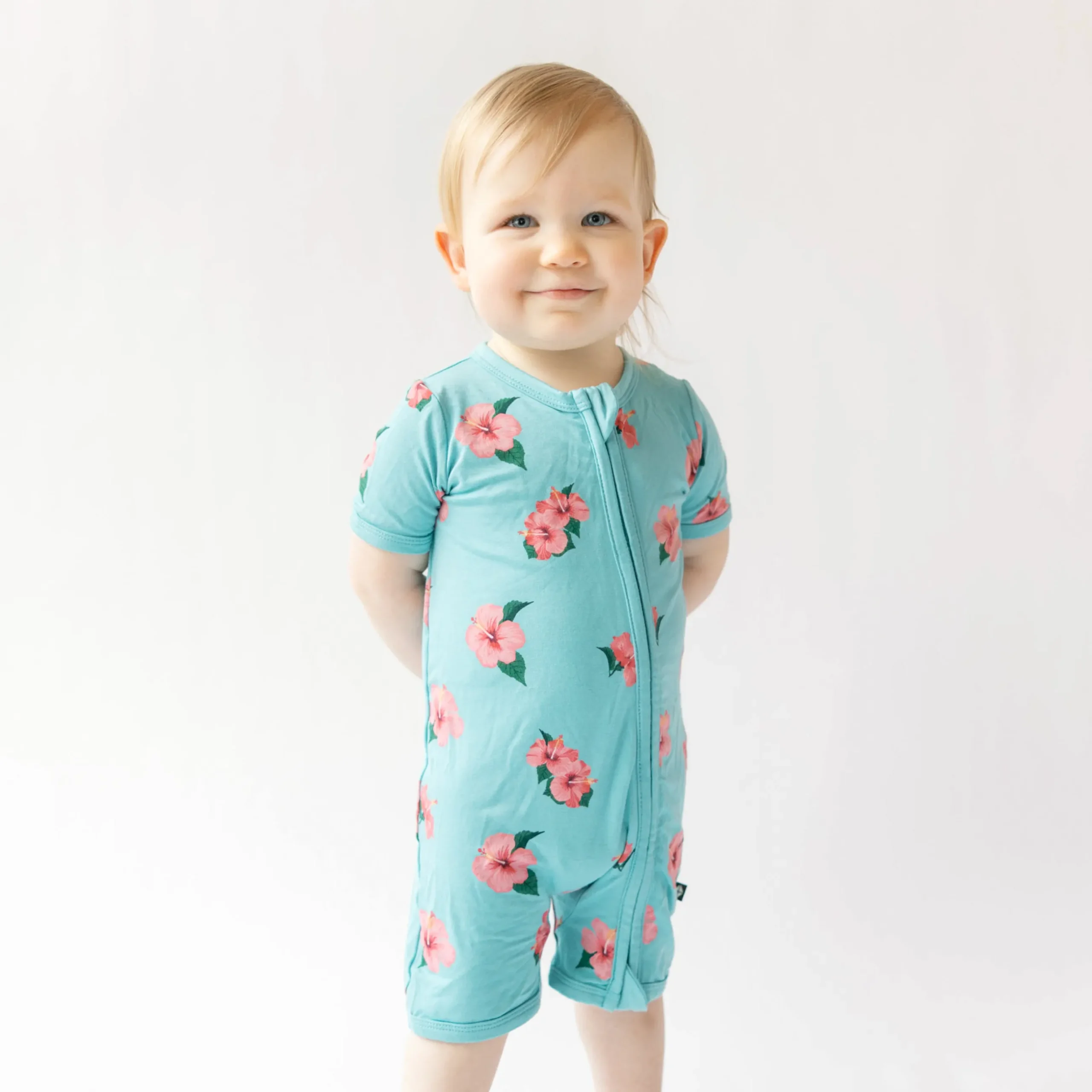 Online Kyte Baby Zippered Shortall Romper in Hibiscus