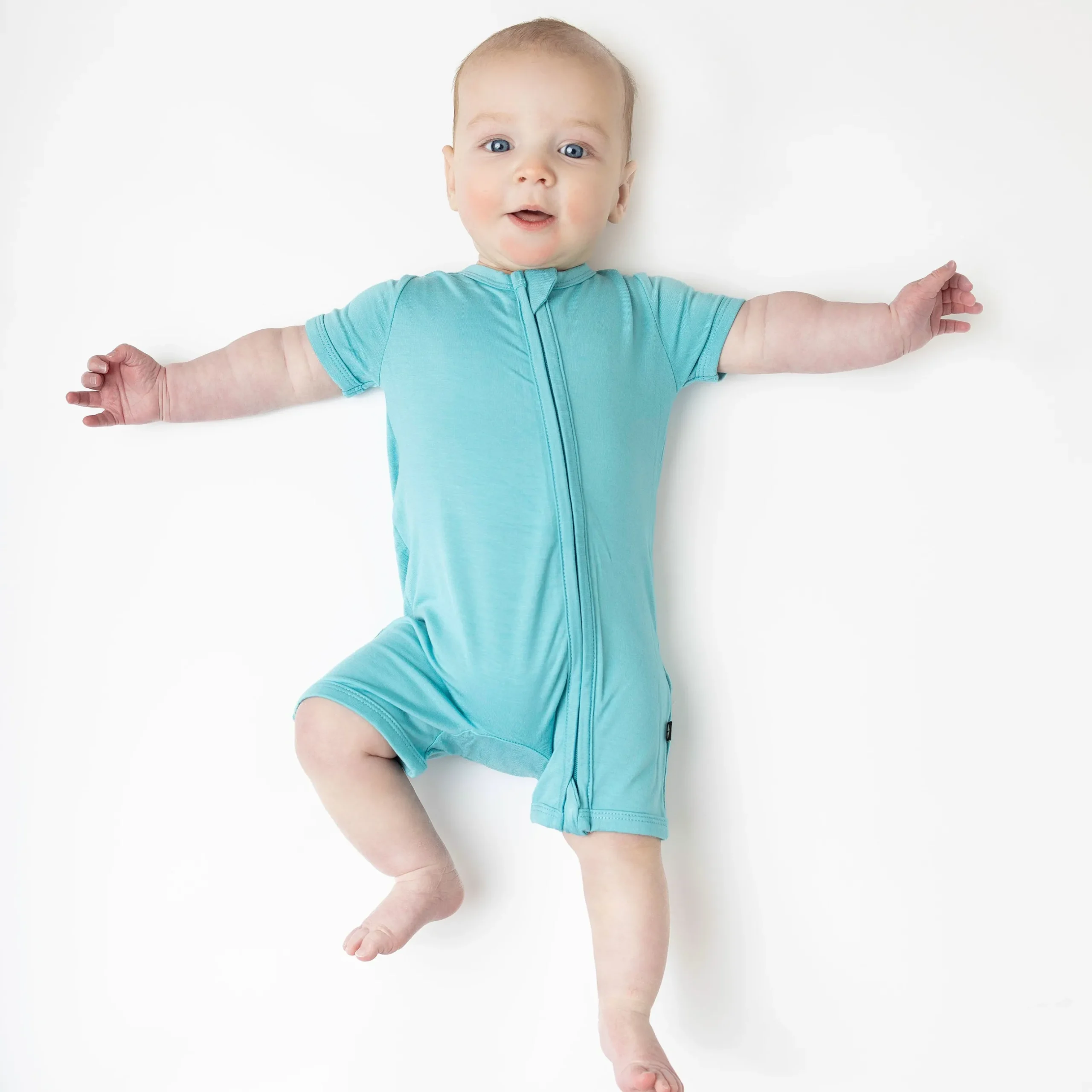 Kyte Baby Zippered Shortall Romper in Makai