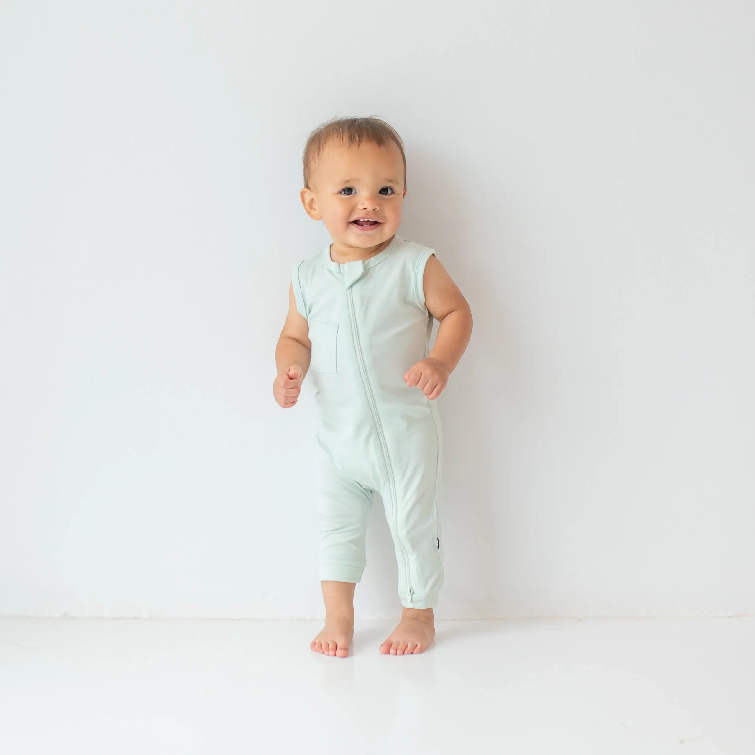 Sale Kyte Baby Zippered Sleeveless Romper in Dew