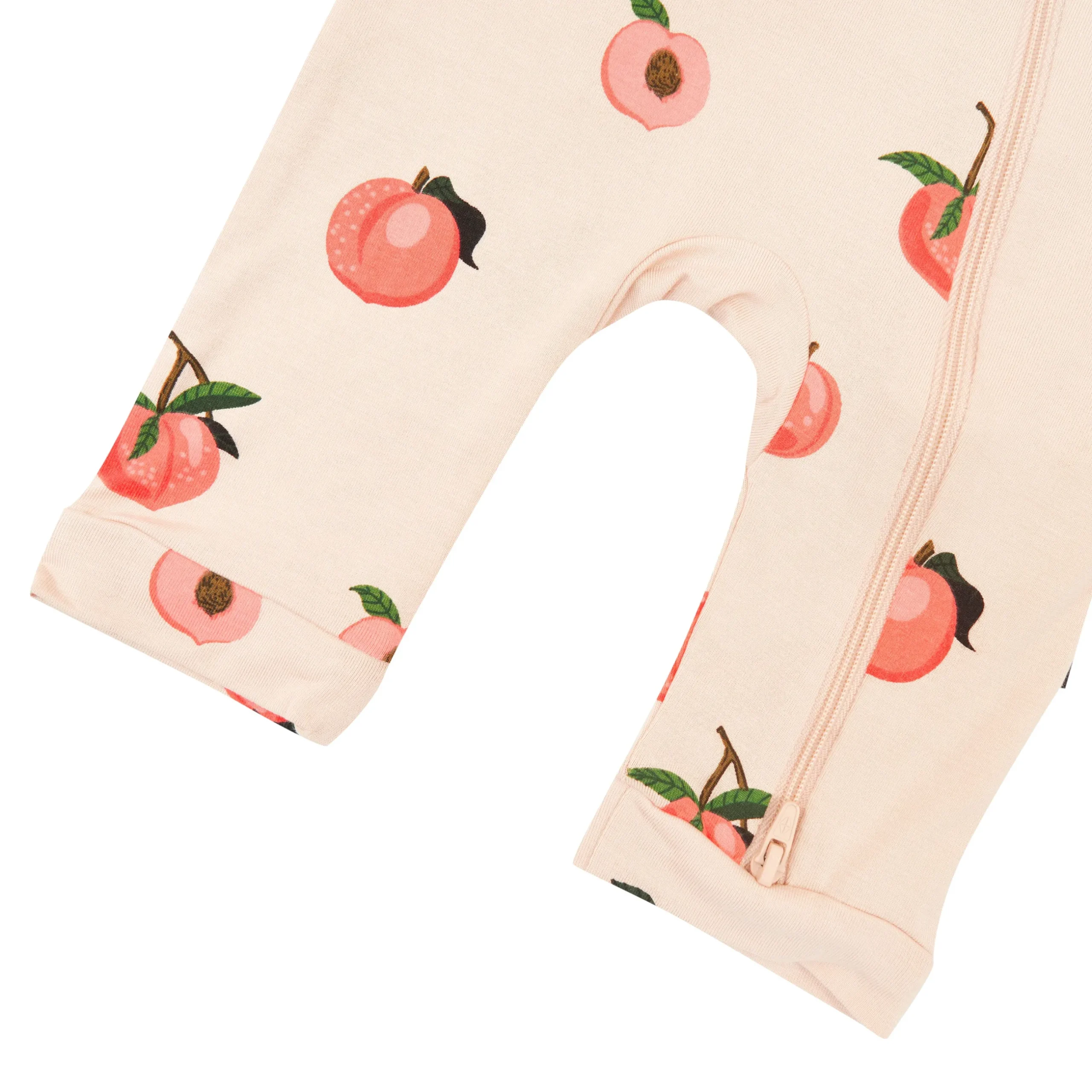 New Kyte Baby Zippered Sleeveless Romper in Peach